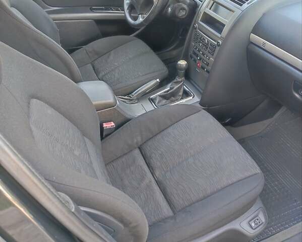 Черный Пежо 407, объемом двигателя 1.6 л и пробегом 242 тыс. км за 4500 $, фото 17 на Automoto.ua