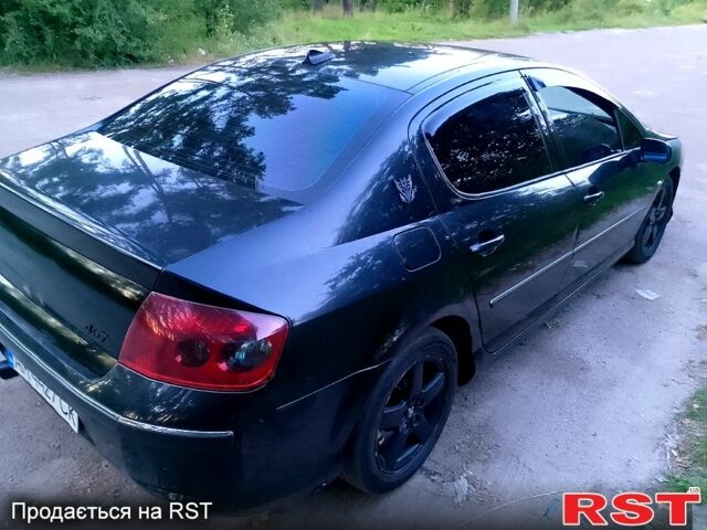Черный Пежо 407, объемом двигателя 2 л и пробегом 301 тыс. км за 3800 $, фото 7 на Automoto.ua