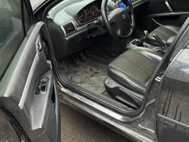 Черный Пежо 407, объемом двигателя 1.8 л и пробегом 220 тыс. км за 3999 $, фото 6 на Automoto.ua