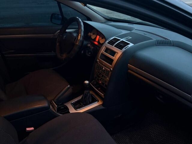 Чорний Пежо 407, об'ємом двигуна 1.7 л та пробігом 206 тис. км за 4600 $, фото 10 на Automoto.ua