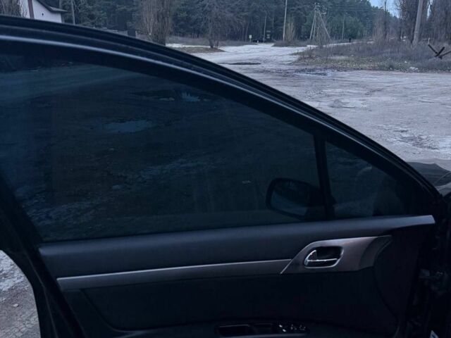 Чорний Пежо 407, об'ємом двигуна 1.7 л та пробігом 206 тис. км за 4600 $, фото 15 на Automoto.ua