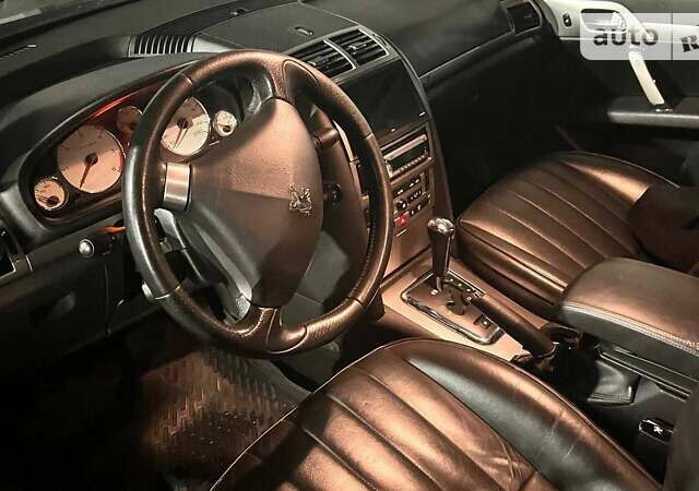 Черный Пежо 407, объемом двигателя 2.72 л и пробегом 300 тыс. км за 4800 $, фото 1 на Automoto.ua