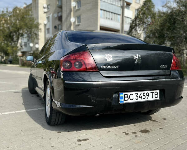 Черный Пежо 407, объемом двигателя 2 л и пробегом 264 тыс. км за 5500 $, фото 14 на Automoto.ua