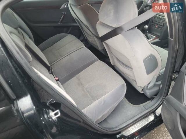 Черный Пежо 407, объемом двигателя 1.56 л и пробегом 250 тыс. км за 2600 $, фото 9 на Automoto.ua