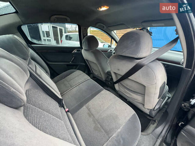 Черный Пежо 407, объемом двигателя 1.56 л и пробегом 200 тыс. км за 2900 $, фото 8 на Automoto.ua