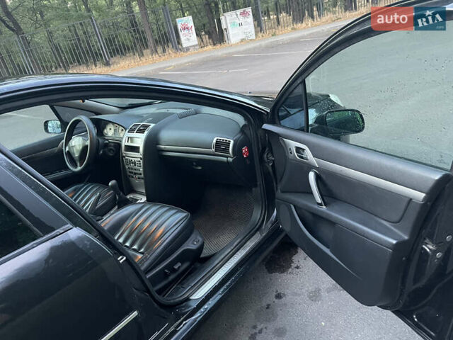 Черный Пежо 407, объемом двигателя 2 л и пробегом 474 тыс. км за 3700 $, фото 13 на Automoto.ua