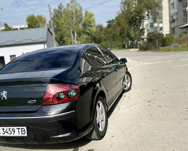 Черный Пежо 407, объемом двигателя 2 л и пробегом 264 тыс. км за 5500 $, фото 17 на Automoto.ua