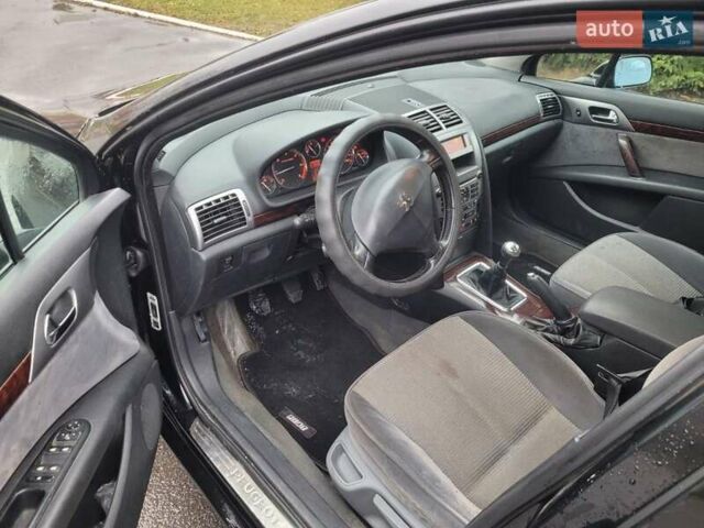 Черный Пежо 407, объемом двигателя 1.56 л и пробегом 250 тыс. км за 2600 $, фото 8 на Automoto.ua
