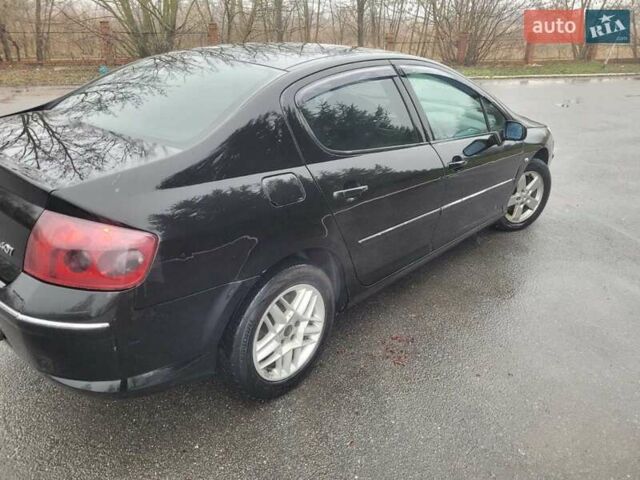 Черный Пежо 407, объемом двигателя 1.56 л и пробегом 250 тыс. км за 2600 $, фото 6 на Automoto.ua