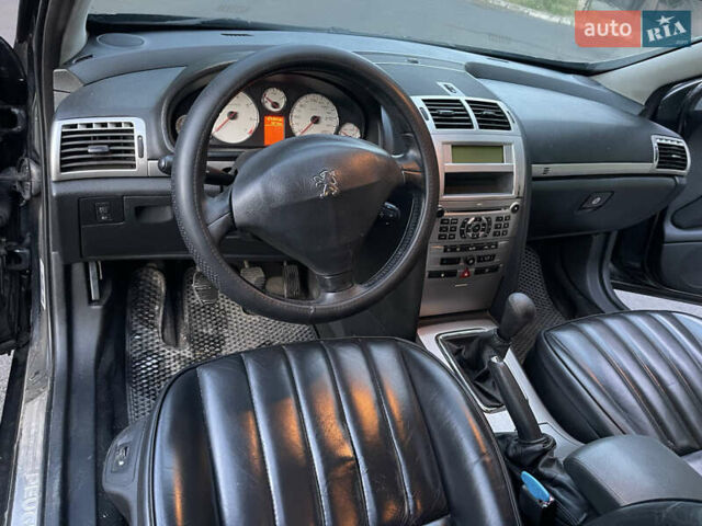Черный Пежо 407, объемом двигателя 2 л и пробегом 474 тыс. км за 3700 $, фото 5 на Automoto.ua