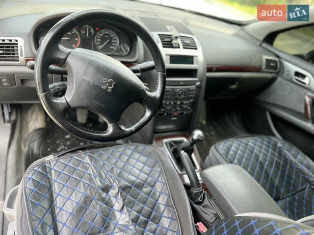 Черный Пежо 407, объемом двигателя 2 л и пробегом 264 тыс. км за 5500 $, фото 20 на Automoto.ua