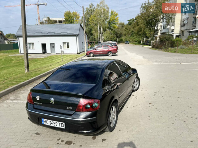 Черный Пежо 407, объемом двигателя 2 л и пробегом 264 тыс. км за 5500 $, фото 10 на Automoto.ua