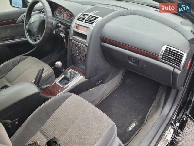 Черный Пежо 407, объемом двигателя 1.56 л и пробегом 250 тыс. км за 2600 $, фото 10 на Automoto.ua