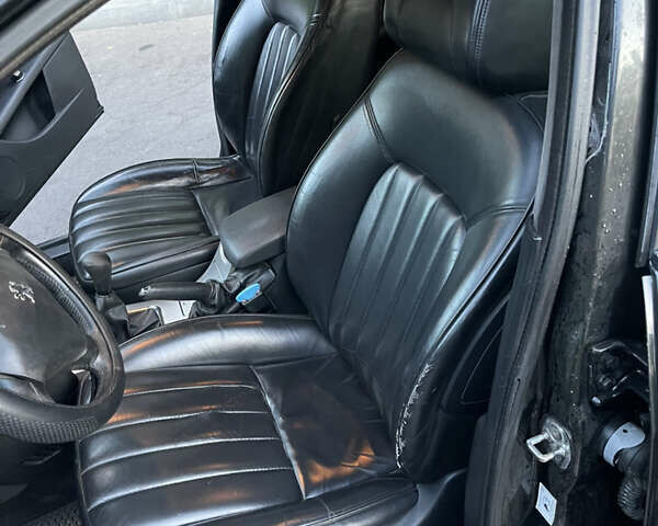 Черный Пежо 407, объемом двигателя 2 л и пробегом 474 тыс. км за 3700 $, фото 4 на Automoto.ua