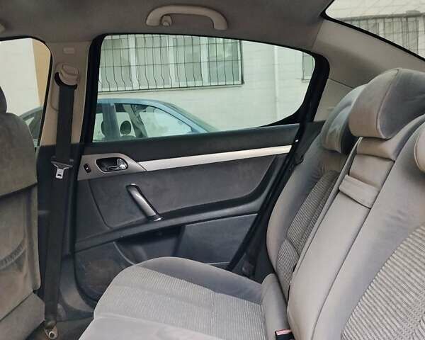 Черный Пежо 407, объемом двигателя 2 л и пробегом 268 тыс. км за 3450 $, фото 5 на Automoto.ua
