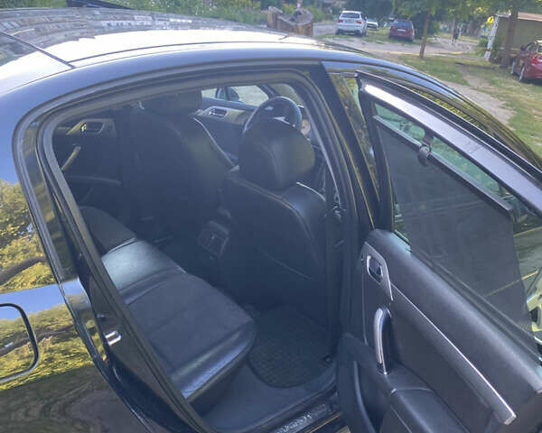 Черный Пежо 407, объемом двигателя 2 л и пробегом 209 тыс. км за 5700 $, фото 7 на Automoto.ua
