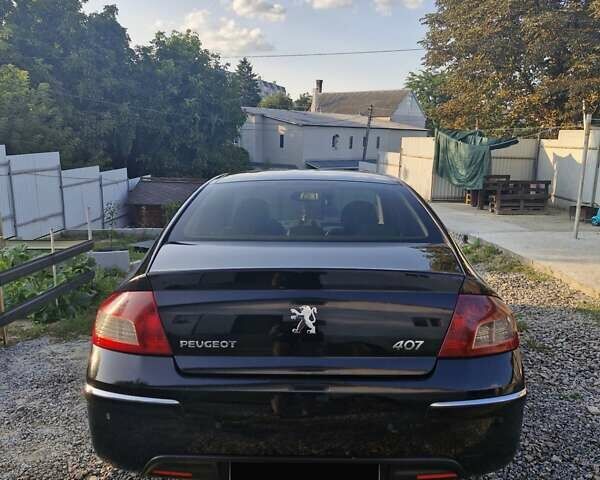 Черный Пежо 407, объемом двигателя 2.01 л и пробегом 290 тыс. км за 5300 $, фото 4 на Automoto.ua
