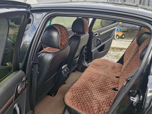 Черный Пежо 407, объемом двигателя 2 л и пробегом 290 тыс. км за 5300 $, фото 7 на Automoto.ua