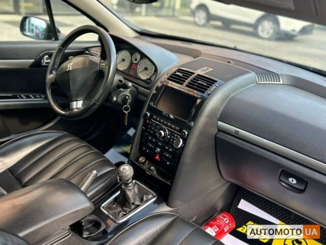 Черный Пежо 407, объемом двигателя 2 л и пробегом 295 тыс. км за 6200 $, фото 11 на Automoto.ua