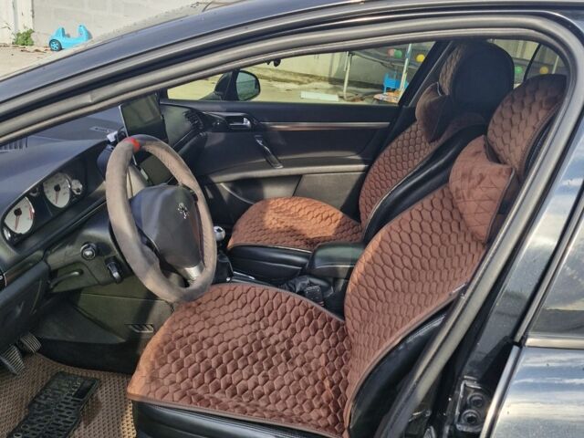 Черный Пежо 407, объемом двигателя 2 л и пробегом 290 тыс. км за 5300 $, фото 5 на Automoto.ua