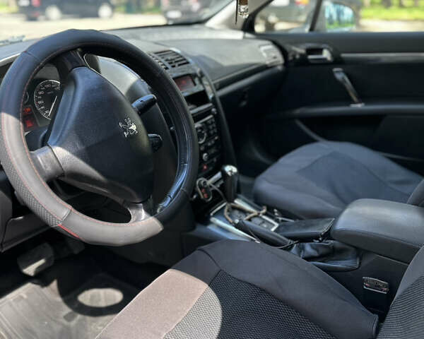 Чорний Пежо 407, об'ємом двигуна 2 л та пробігом 205 тис. км за 5200 $, фото 4 на Automoto.ua