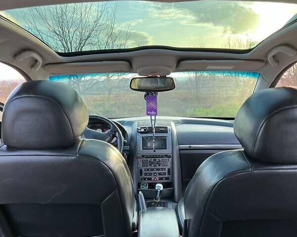 Черный Пежо 407, объемом двигателя 2 л и пробегом 307 тыс. км за 5100 $, фото 20 на Automoto.ua