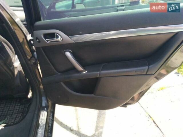 Черный Пежо 407, объемом двигателя 2 л и пробегом 320 тыс. км за 4200 $, фото 8 на Automoto.ua