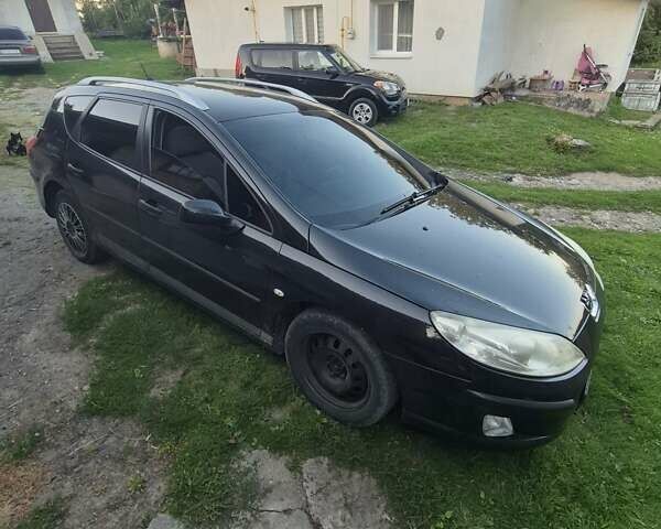 Черный Пежо 407, объемом двигателя 2 л и пробегом 254 тыс. км за 4500 $, фото 16 на Automoto.ua