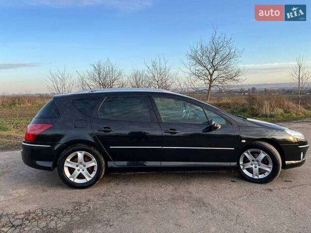 Черный Пежо 407, объемом двигателя 2 л и пробегом 307 тыс. км за 5100 $, фото 11 на Automoto.ua