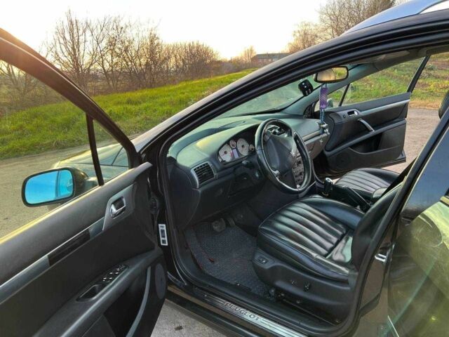 Черный Пежо 407, объемом двигателя 2 л и пробегом 306 тыс. км за 5000 $, фото 16 на Automoto.ua