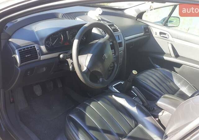 Черный Пежо 407, объемом двигателя 1.6 л и пробегом 285 тыс. км за 4800 $, фото 4 на Automoto.ua