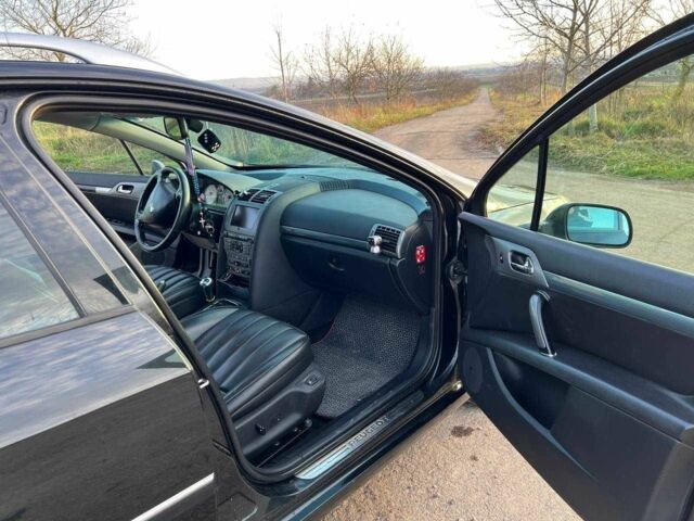 Черный Пежо 407, объемом двигателя 2 л и пробегом 306 тыс. км за 5000 $, фото 11 на Automoto.ua