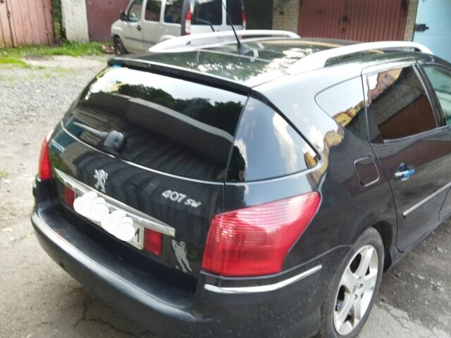 Чорний Пежо 407, об'ємом двигуна 2 л та пробігом 240 тис. км за 5400 $, фото 5 на Automoto.ua