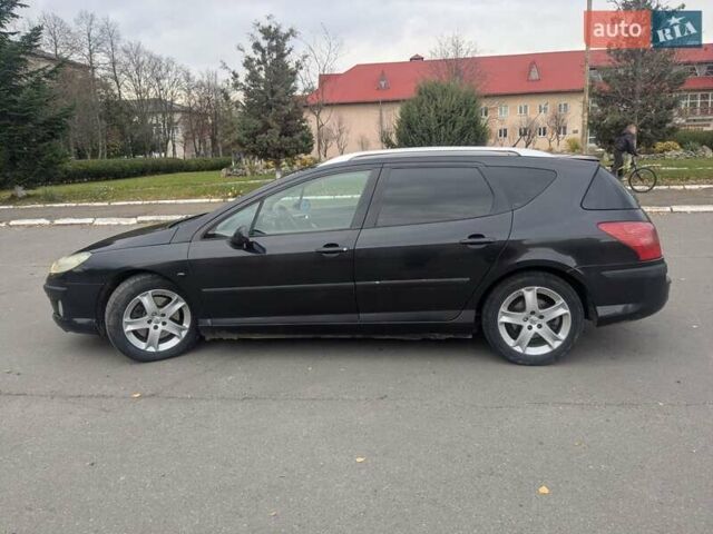 Черный Пежо 407, объемом двигателя 2.18 л и пробегом 306 тыс. км за 4800 $, фото 6 на Automoto.ua