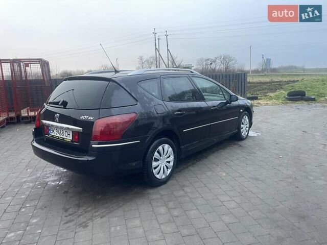 Черный Пежо 407, объемом двигателя 1.56 л и пробегом 270 тыс. км за 2499 $, фото 3 на Automoto.ua