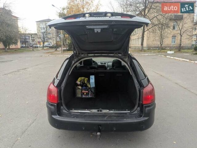 Черный Пежо 407, объемом двигателя 2.18 л и пробегом 306 тыс. км за 4800 $, фото 4 на Automoto.ua