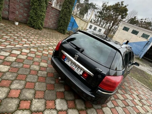 Чорний Пежо 407, об'ємом двигуна 1.7 л та пробігом 197 тис. км за 4500 $, фото 3 на Automoto.ua