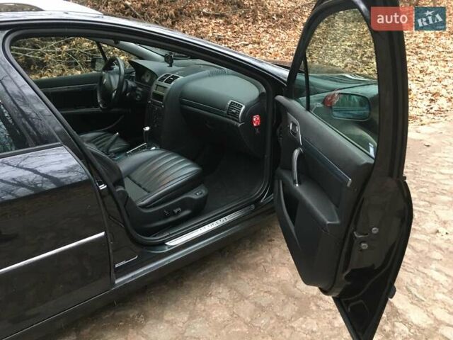 Черный Пежо 407, объемом двигателя 2 л и пробегом 290 тыс. км за 6200 $, фото 1 на Automoto.ua