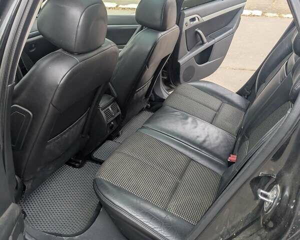 Черный Пежо 407, объемом двигателя 2.18 л и пробегом 306 тыс. км за 4800 $, фото 2 на Automoto.ua