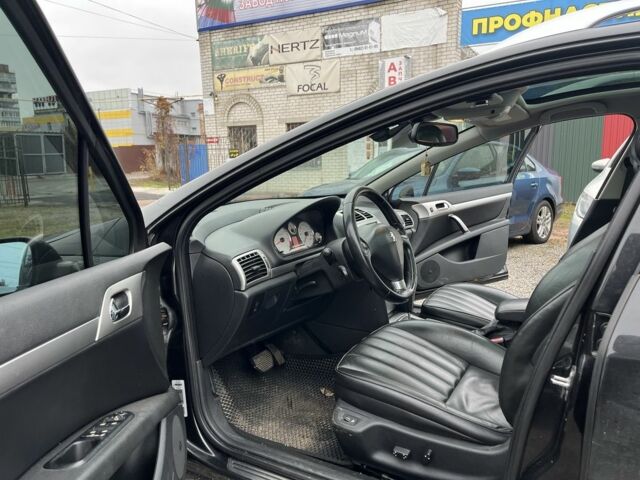 Черный Пежо 407, объемом двигателя 2.7 л и пробегом 310 тыс. км за 5000 $, фото 7 на Automoto.ua