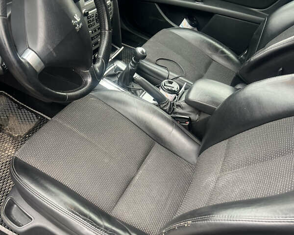 Черный Пежо 407, объемом двигателя 2.18 л и пробегом 265 тыс. км за 5200 $, фото 6 на Automoto.ua