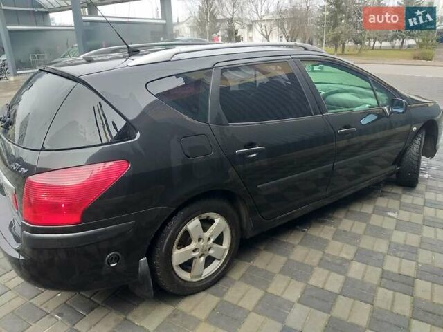 Черный Пежо 407, объемом двигателя 1.8 л и пробегом 240 тыс. км за 4700 $, фото 4 на Automoto.ua