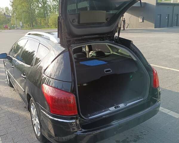 Чорний Пежо 407, об'ємом двигуна 2 л та пробігом 259 тис. км за 4999 $, фото 18 на Automoto.ua
