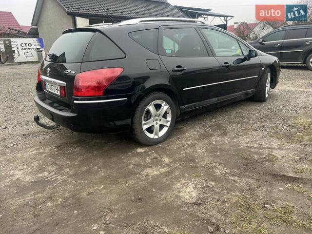 Черный Пежо 407, объемом двигателя 2.18 л и пробегом 265 тыс. км за 5200 $, фото 1 на Automoto.ua