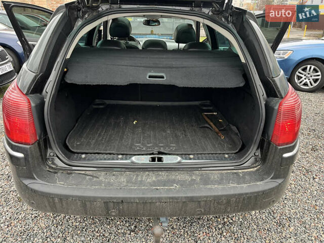 Черный Пежо 407, объемом двигателя 2.72 л и пробегом 310 тыс. км за 5000 $, фото 12 на Automoto.ua