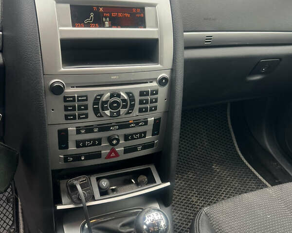 Черный Пежо 407, объемом двигателя 2.18 л и пробегом 265 тыс. км за 5200 $, фото 7 на Automoto.ua