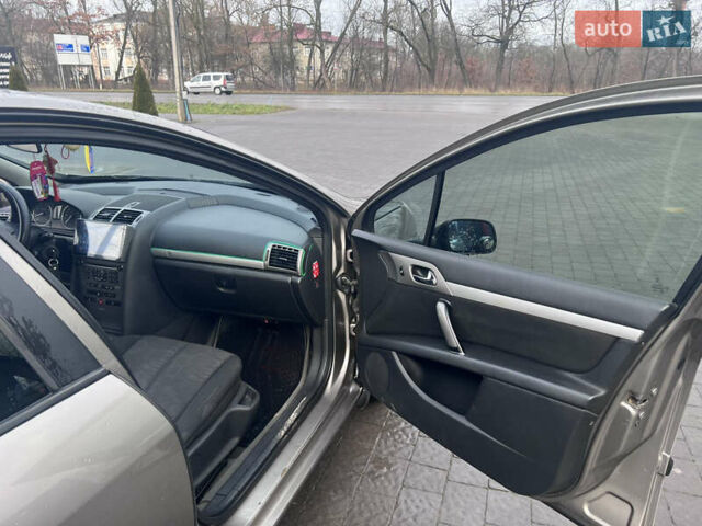 Коричневый Пежо 407, объемом двигателя 1.75 л и пробегом 262 тыс. км за 3950 $, фото 15 на Automoto.ua
