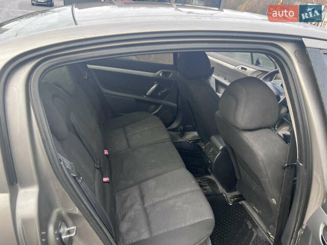 Коричневый Пежо 407, объемом двигателя 1.75 л и пробегом 262 тыс. км за 3950 $, фото 14 на Automoto.ua