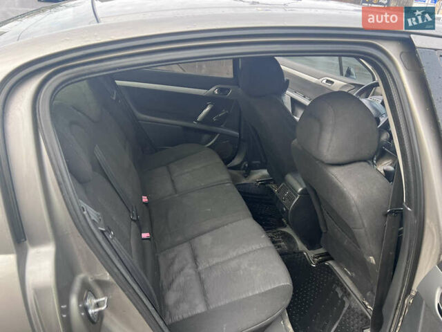 Коричневый Пежо 407, объемом двигателя 1.75 л и пробегом 262 тыс. км за 3950 $, фото 13 на Automoto.ua
