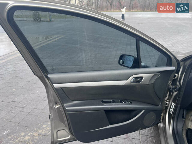 Коричневый Пежо 407, объемом двигателя 1.75 л и пробегом 262 тыс. км за 3950 $, фото 6 на Automoto.ua